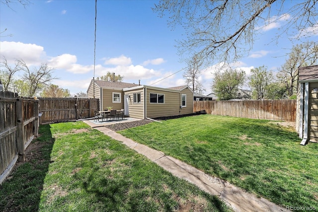 view of yard with a patio and a fenced backyard