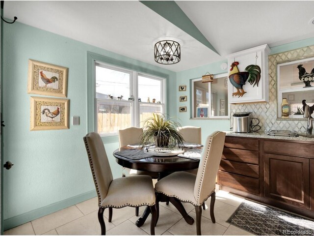 317 Adams Ave, Akron, CO 80720 - dining space featuring light tile patterned floors