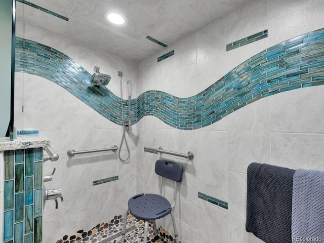 317 Adams Ave, Akron, CO 80720 - bathroom featuring a tile shower
