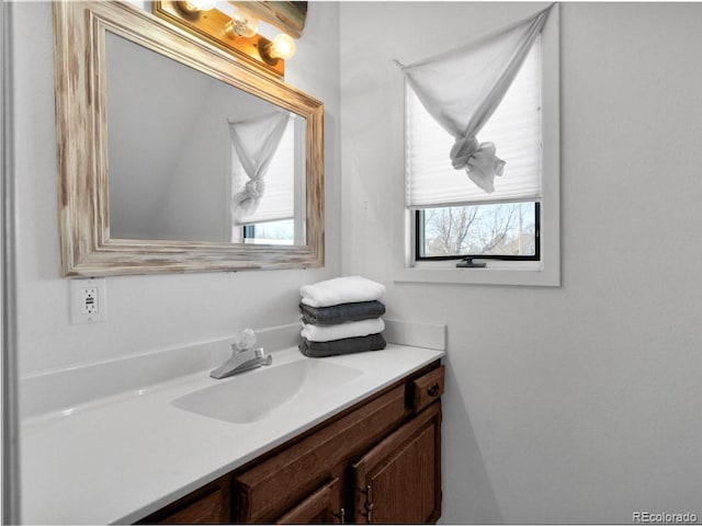 317 Adams Ave, Akron, CO 80720 - bathroom featuring vanity and plenty of natural light