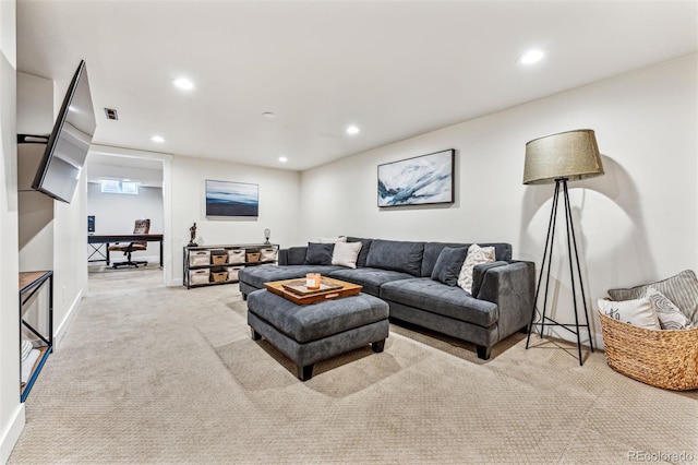 living room featuring light carpet