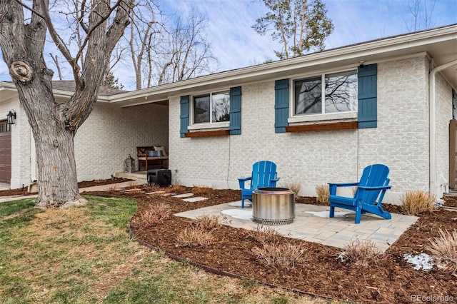 back of house with a patio area