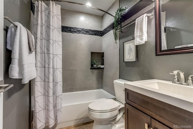 full bathroom featuring shower / bath combo with shower curtain, vanity, and toilet