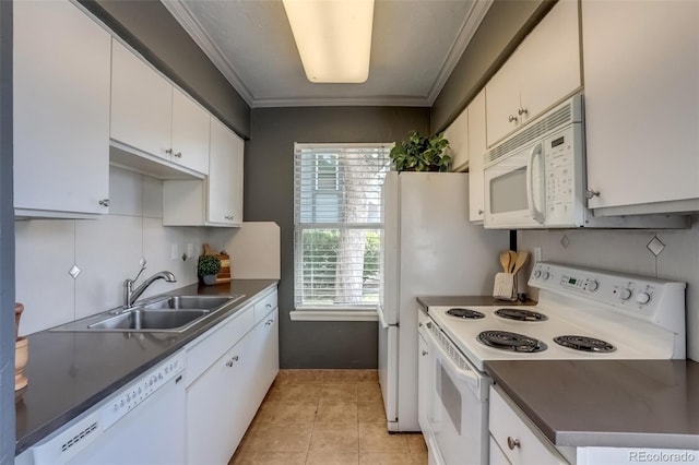 kitchen featuring white appliances, white cabinetry, crown molding, and sink