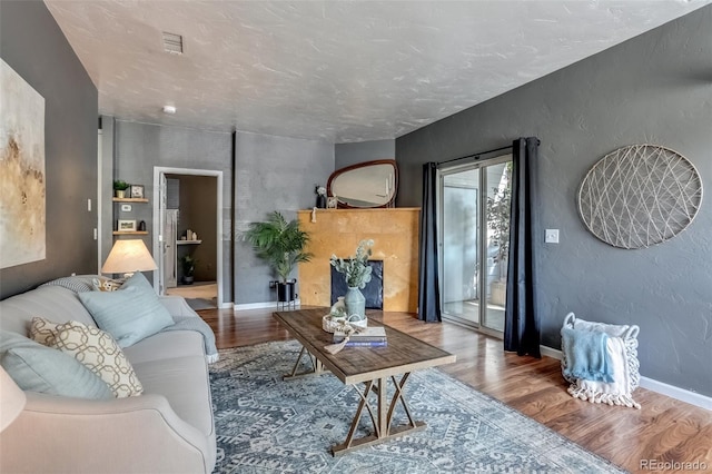 living room with hardwood / wood-style flooring