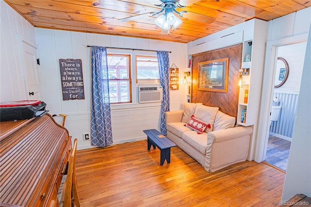 24938 US Highway 50, Cotopaxi, CO 81223 - living area with wood ceiling, light wood-type flooring, ceiling fan, and cooling unit