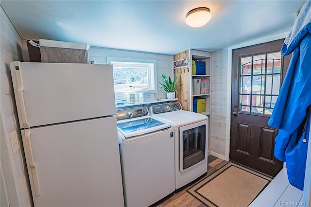 24938 US Highway 50, Cotopaxi, CO 81223 - washroom featuring washer and dryer and wood finished floors