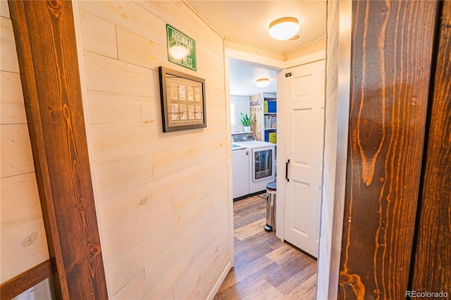 24938 US Highway 50, Cotopaxi, CO 81223 - hall with washing machine and clothes dryer and wood finished floors