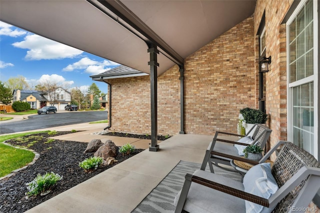 view of patio / terrace with a residential view