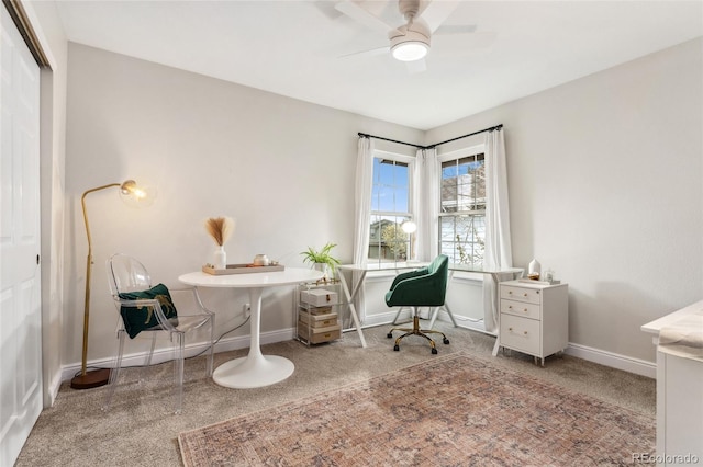 office with baseboards, ceiling fan, and carpet