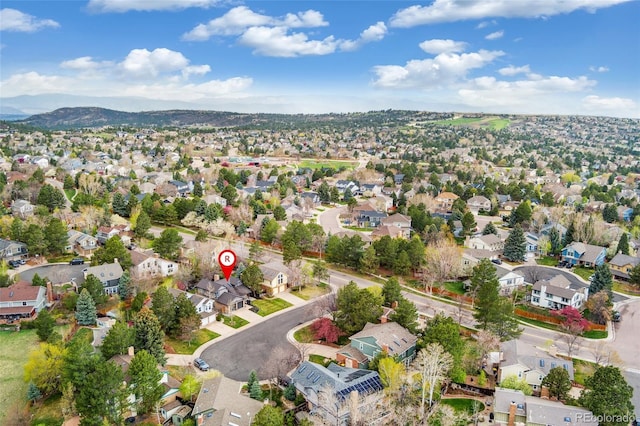 aerial view featuring a mountain view and a residential view