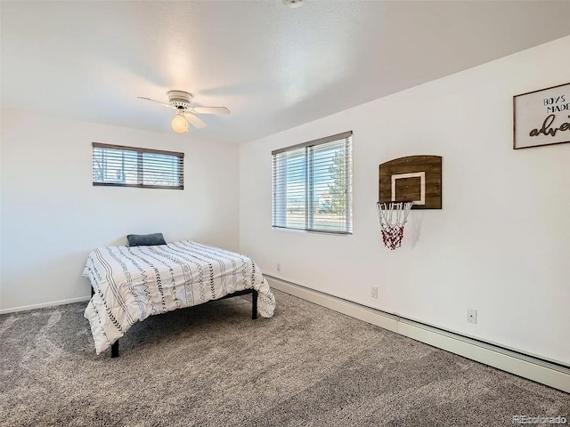 9910 Ammons Cir, Westminster, CO 80021 - bedroom with multiple windows, carpet flooring, and baseboard heating