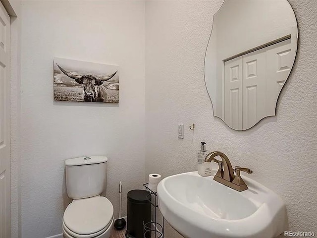9910 Ammons Cir, Westminster, CO 80021 - bathroom featuring a sink and toilet