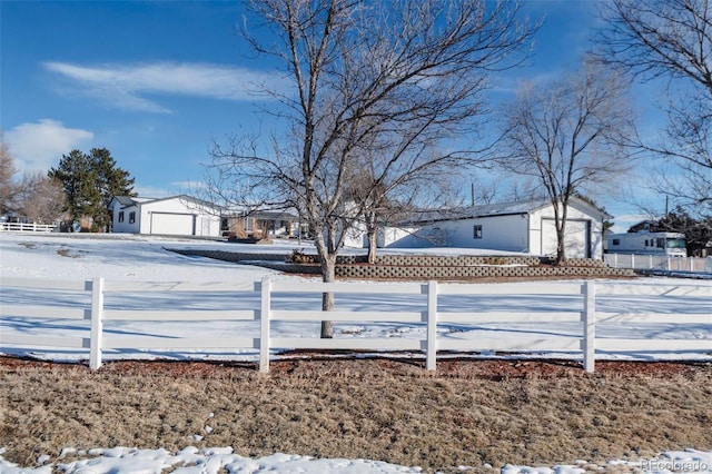 9910 Ammons Cir, Westminster, CO 80021 - snowy yard featuring fence