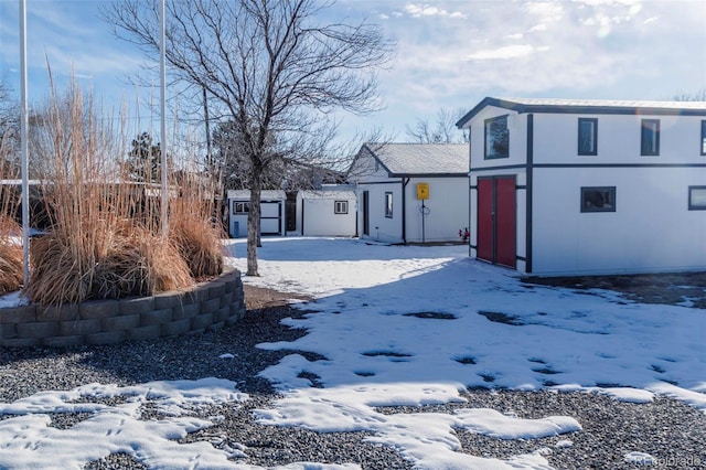 9910 Ammons Cir, Westminster, CO 80021 - yard covered in snow with an outbuilding
