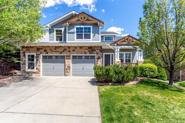 7234 S Kellerman Way, Aurora, CO 80016 - craftsman-style house featuring stone siding, driveway, a front lawn, a garage, and covered porch