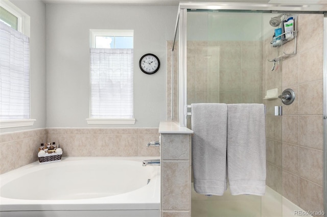 7234 S Kellerman Way, Aurora, CO 80016 - full bath with a stall shower, a garden tub, and healthy amount of natural light