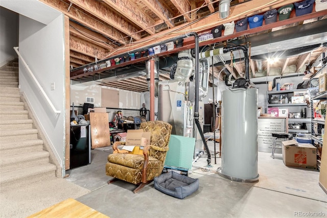 7234 S Kellerman Way, Aurora, CO 80016 - unfinished below grade area featuring gas water heater, stairs, and heating unit