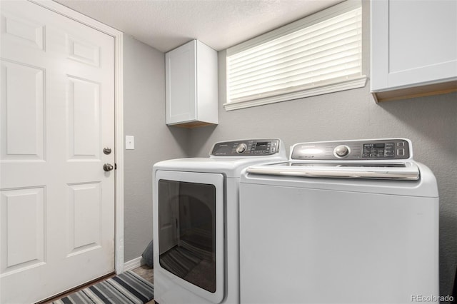 7234 S Kellerman Way, Aurora, CO 80016 - washroom featuring independent washer and dryer, cabinet space, a textured ceiling, and baseboards