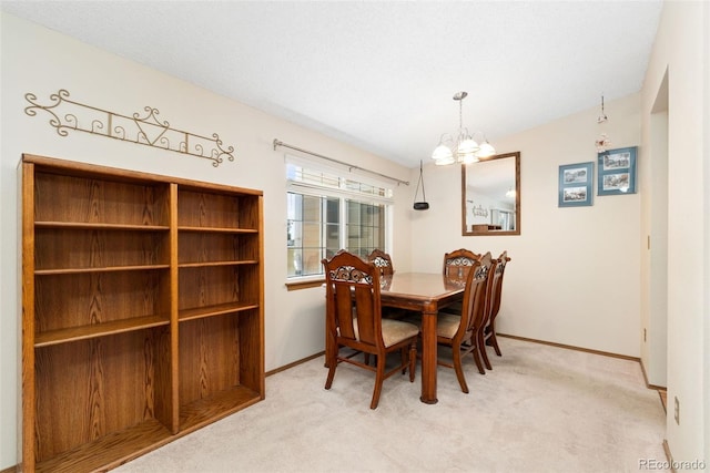 8404 Everett Way Unit A, Arvada, CO 80005 - dining space with a chandelier and light colored carpet