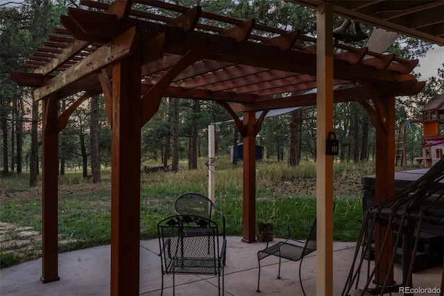 view of patio / terrace featuring a pergola