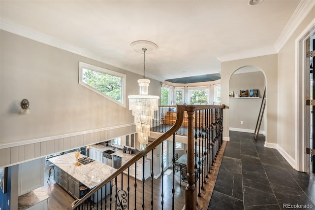 interior space with crown molding