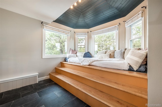 bedroom with crown molding