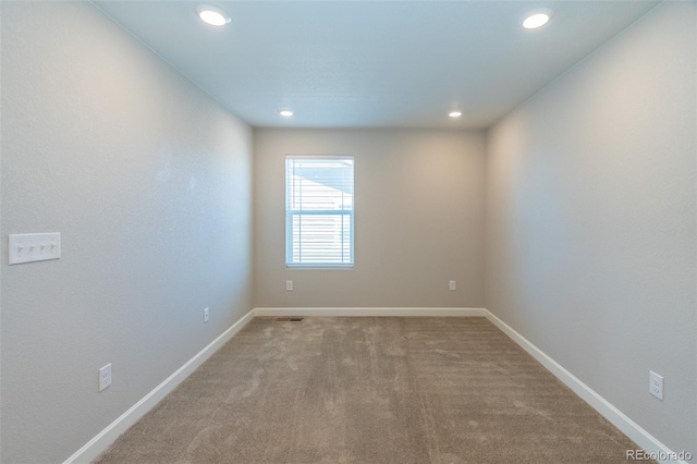 view of carpeted spare room