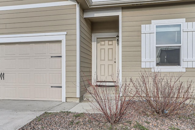 215 N Stewart St, Keenesburg, CO 80643 - view of exterior entry with a garage