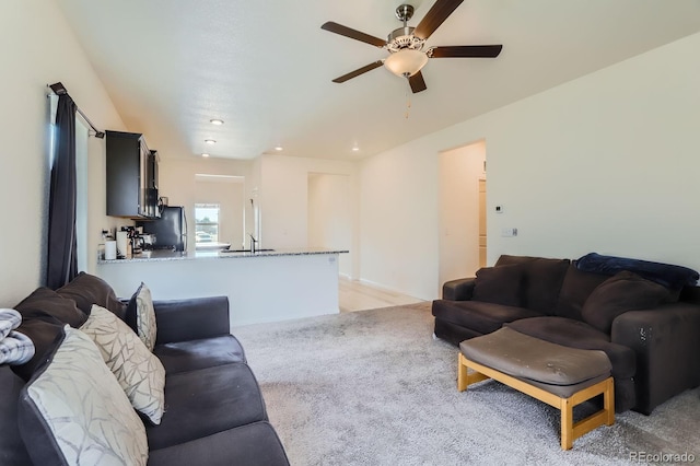 215 N Stewart St, Keenesburg, CO 80643 - living area with ceiling fan, light colored carpet, and recessed lighting