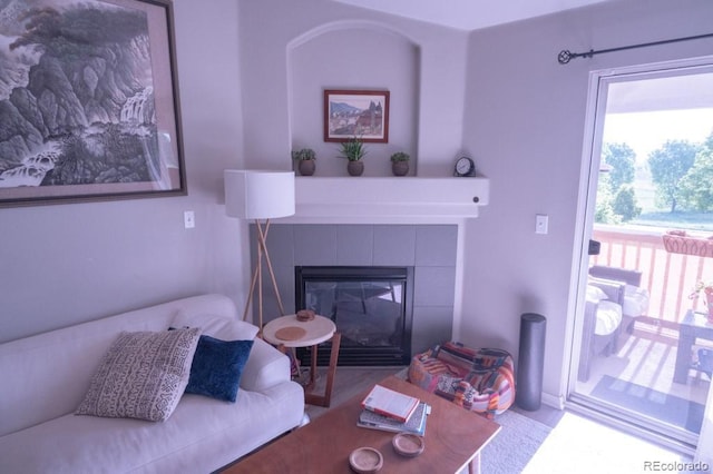 8200 E 8th Ave Unit 1203, Denver, CO 80230 - living room featuring a tile fireplace