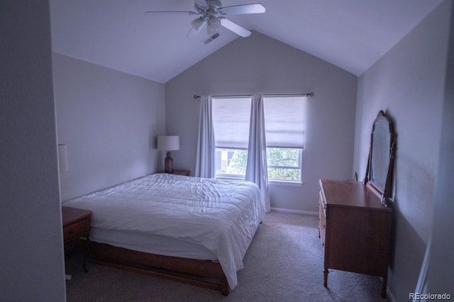 8200 E 8th Ave Unit 1203, Denver, CO 80230 - bedroom with vaulted ceiling, a ceiling fan, and carpet flooring