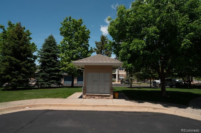 8200 E 8th Ave Unit 1203, Denver, CO 80230 - view of home's community with mail area and a yard