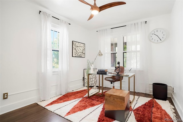 office with hardwood / wood-style floors and ceiling fan