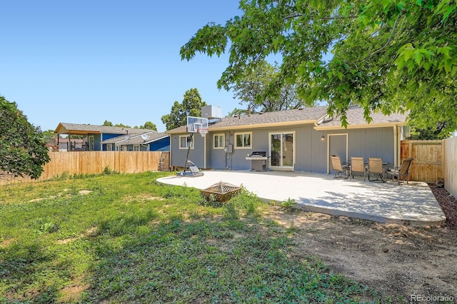 2615 S Laredo Ct, Aurora, CO 80013 - rear view of house featuring a fenced backyard and a patio