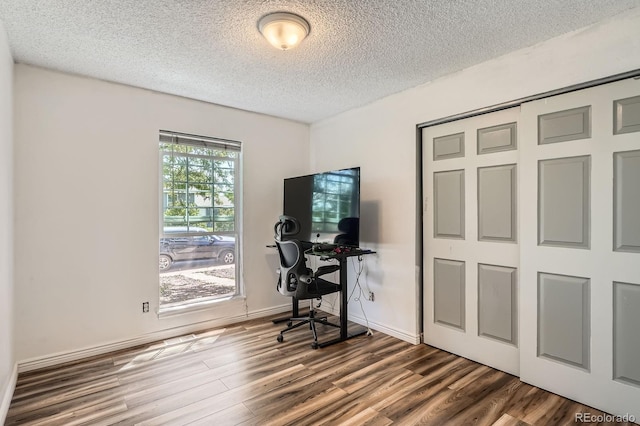 2615 S Laredo Ct, Aurora, CO 80013 - home office featuring wood finished floors and a textured ceiling
