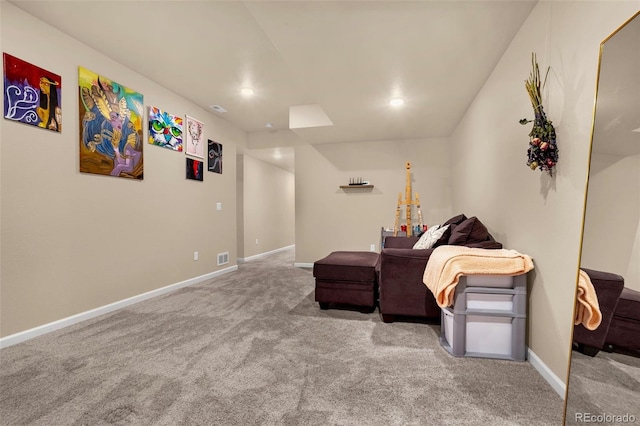 sitting room with carpet flooring