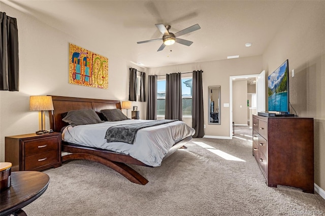 bedroom with ceiling fan and carpet floors