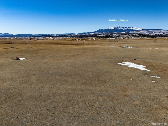 exterior space with a mountain view and a rural view