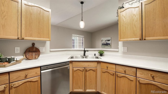 kitchen with dishwasher, lofted ceiling, sink, and light brown cabinetry