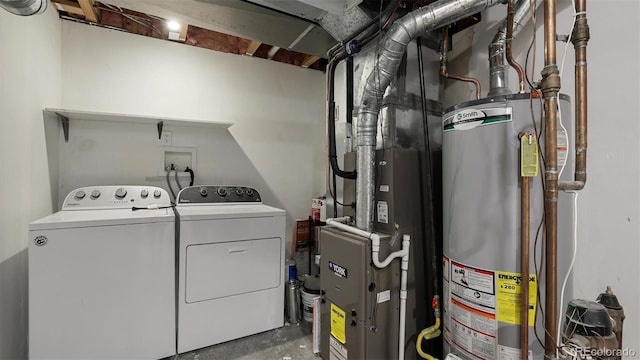 washroom with separate washer and dryer and gas water heater