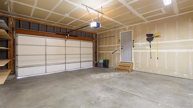 garage featuring a garage door opener