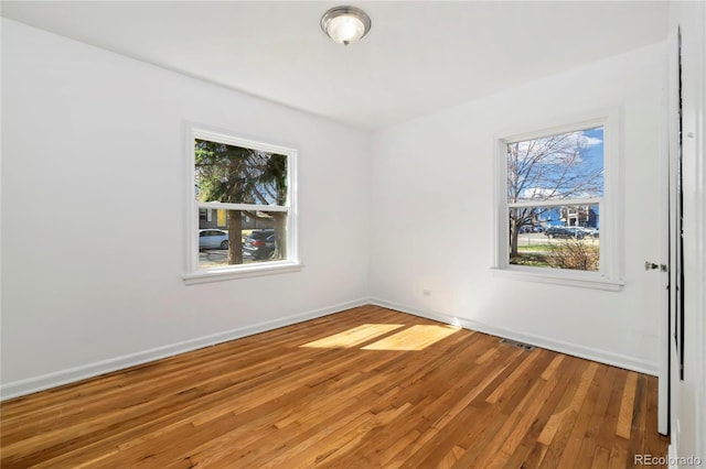 2570 Jay St, Edgewater, CO 80214 - unfurnished room featuring wood finished floors and baseboards
