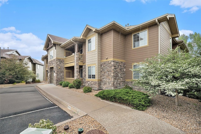 8039 Lee Dr Unit 2, Arvada, CO 80005 - view of building exterior with uncovered parking
