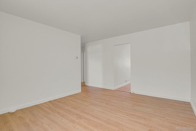 373 S Hazel Ct, Denver, CO 80219 - empty room featuring light wood-type flooring and baseboards