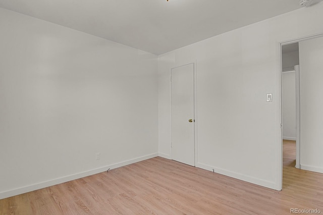 373 S Hazel Ct, Denver, CO 80219 - empty room with light wood-style flooring and baseboards