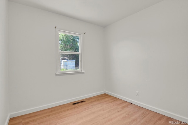 373 S Hazel Ct, Denver, CO 80219 - spare room featuring light wood-style floors