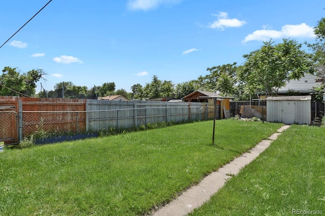 373 S Hazel Ct, Denver, CO 80219 - view of yard featuring a storage shed