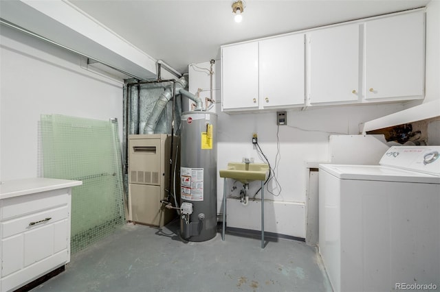 interior space with washer / clothes dryer and water heater