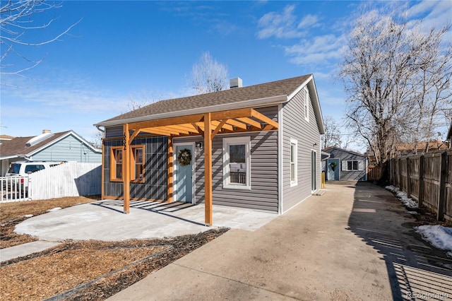 view of front of home with a patio area